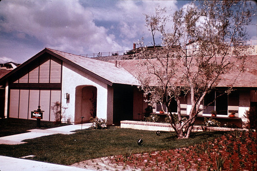 [La Paz model home exterior, plan 20, San Juan slide]