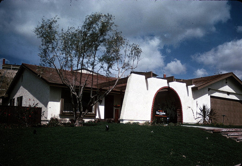 [La Paz model home exterior, San Carlos slide]