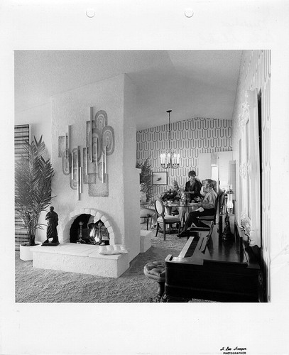 [Casta del Sol's Guadalupe model home fireplace and dining room photograph]