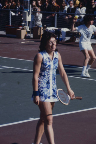 [Billie Jean King on tennis court in Mission Viejo slide]