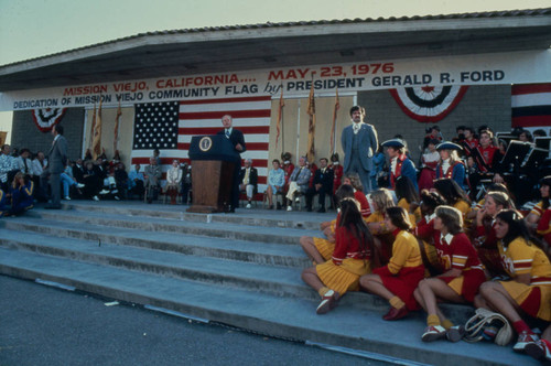 [President Gerald Ford at dedication of Mission Viejo community flag, 1976 slide]