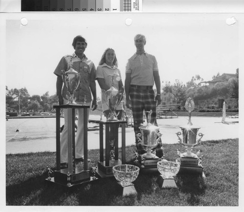 [Swimming trophies, circa 1977 photograph]