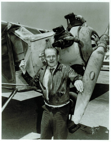 Douglas "Wrong Way" Corrigan and his airplane at Northrop Airport in Hawthorne