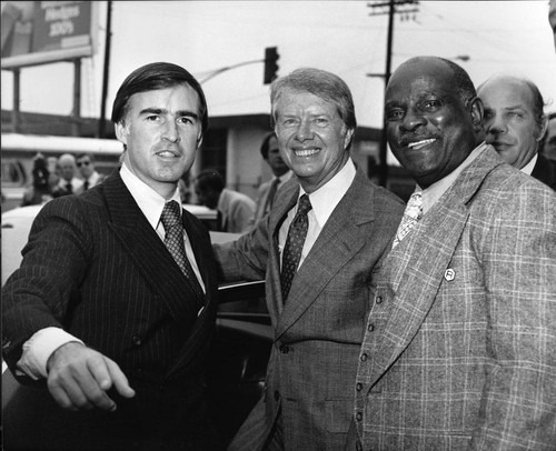 Jerry Brown and Jimmy Carter posing with Ted Watkins, Los Angeles, ca. 1977