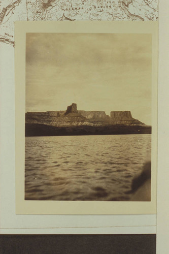 Down Labyrinth Canyon from below Fort Bottom showing the butte off the end of Steer Mesa and Candlestick Tower at left. Eddy was in this area 1927, June 29, but it is doubtful that his photography is shown in this picture