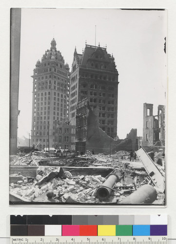 [View of ruins and rubble, near Kearny St. looking south toward Market St. Call Building, left; Mutual Savings Building, right.]