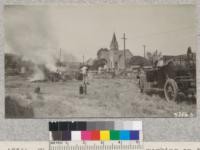 The Newman truck outfit working on the fire as well as the little Pacific pumper. Stanislaus County. Metcalf. May, 1828