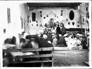 Interior of the church at San Jose, New Mexico, during a Mexican wedding, ca.1898