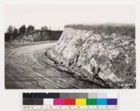 Soil profile as shown by road cut of grass type on southwest slope. Note black clay loam surface soil overlying Monterey shale. Chaparral and sage types are found in this locality where Monterey shale is exposed. Black clay loam lost by erosion