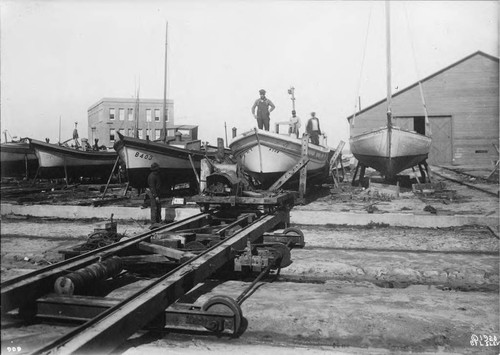 Photograph of Monterey Boat Works With Boat-Moving ""Car""