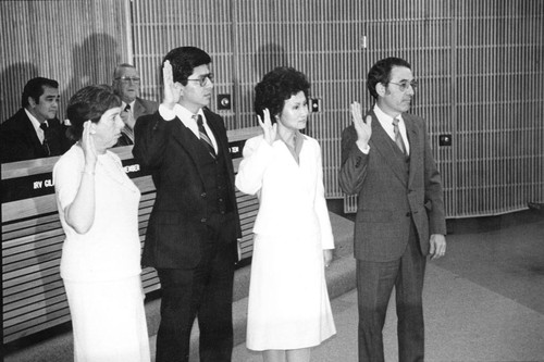 Photograph of council members taking an oath