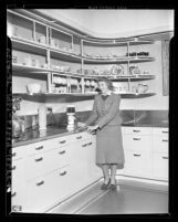 Anna Marie Peters in "Modern California" kitchen exhibit at Southern California Home Show, 1938