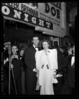 Actors Barbara Stanwyck and Robert Taylor at the film premiere of "Meet John Doe" in Los Angeles, Calif., 1941