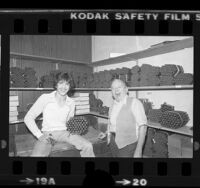 Victor Migenes and son Tito, at La Plata Cigar Co. shop in Los Angeles, Calif., 1980