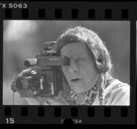 Iron Eyes Cody filming dedication of Indian Garden with a Quasar VHS camcorder in Los Angeles, 1986