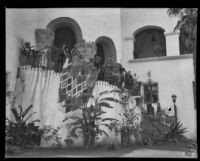 Dancers in the Old Spanish Days Fiesta on the rotunda staircase in the garden of the courthouse, Santa Barbara, 1930