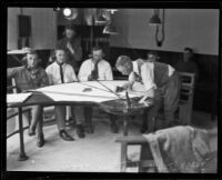 Civilians practice plotting target coordinates for defense battery guns at Ft. MacArthur, 1921