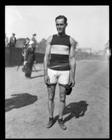 Track athlete poses during the Pacific Fleet championship track meet, Long Beach, 1922