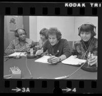 Roscoe Lee Browne, Kate Rickman, Peter Bonerz, and Sally Smaller performing reading of Watergate tapes on KPFK radio in Los Angeles, Calif., 1974