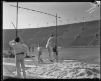 Stanford vaulter lands after a pole-vault attempt during the S.C. and Stanford dual track meet, Los Angeles, 1934