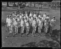 Members of the Junior Police Bicycle Corps pose with their bikes, Inglewood, 1938