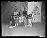 Archbishop John J. Cantwell with children at dedication for Chinese Catholic Social Center, 1942