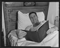 Billy Stamps reads in bed, Pasadena, 1935