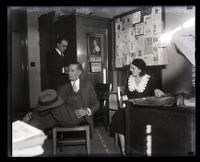 Rodman Robeson and Helen A. Hamilton Robeson meet at City Hall after a 22-year separation, Los Angeles, 1931