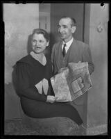 Mr. and Mrs. James Roy Willis show a map of the oil land they inherited, Los Angeles, 1936