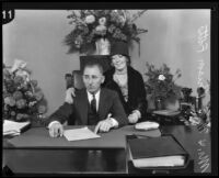 Buron Fitts and wife Marion Fitts in his office, Los Angeles, 1927-1939