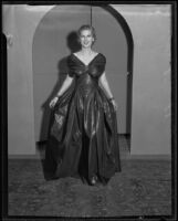 Woman models an iridescent gown at the Times' fashion show, Los Angeles, 1935