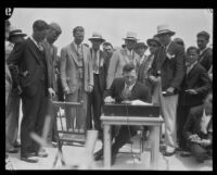 John Hunter makes a radio broadcast from an air field, Los Angeles, 1930