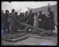 Collapsed grandstand on the route of the Tournament of Roses Parade, Pasadena, 1926