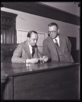 Jacob Berman in a witness stand questioned by chief deputy district attorney Robert Stewart, Los Angeles, 1928-1930