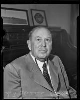 S.T. Bledsoe, President of Santa Fe Railway visiting Los Angeles to check on Union Station project, Los Angeles, 1935