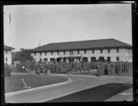 Dozens of officers from a Coast Artillery unit take part in a ceremony at Ft. MacArthur in San Pedro, 1920-1939