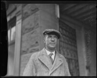 Upton Sinclair in an overcoat and cap, 1920-1939