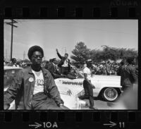 Cassius Clay waves to crowd at Watts Summer Festival