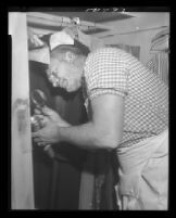 Investigator probably at the home of murder victim Mabel Monahan, Burbank, 1953