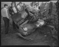 Men and boys examine the remains of the airplane that crashed, killing Ralph Wagner and Jack Kelder, Manhattan Beach, 1935