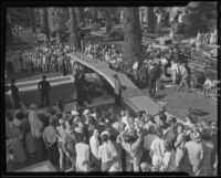 Plane crashes in front yard at Van Ness and Slauson, Los Angeles, 1935