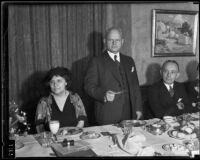 Civic activist Louise Ward Watkins seated next to an unidentified man, Southern California, 1934