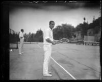 Norval Craig standing with tennis racket, Midwick Country Club, Alhambra, 1925