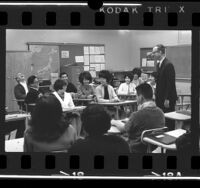 Instructor Marvin D. Follet conducting Japanese language class to Japanese American high school students in Gardena, Calif., 1966