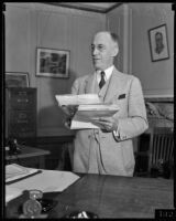 Postmaster Henry B. R. Briggs in his office, Los Angeles, 1934-1936