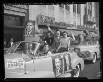 Young Republicans and Wallace Braden riding in cars covered with campaign signs in Los Angeles, Calif., 1948