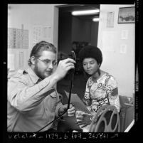 Television reporter Gail Christian with editor Chuck Kocsis at KNBC-TV, Los Angeles, Calif., 1967