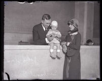 John R. Quinn meets with wife Maude a daughter at Seaboard National Bank, Los Angeles, 1924-1928