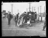 Los Angeles police dragging three studio strikers off to jail in 1946