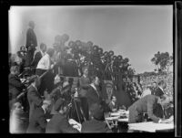 Press corps documents President Franklin Roosevelt's address at Balboa Stadium, San Diego, 1935